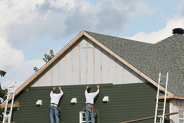 Professional Siding Contractor technician working in New Vienna, OH